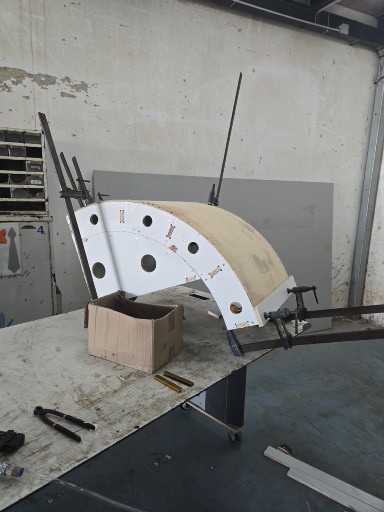 A curved carcass in assembly
